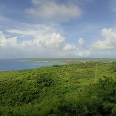 Path through limestone forest to lookout