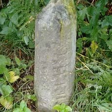 Milestone, by Cottage Farm, W of A614 roundabout