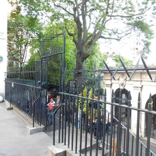 Gateway And Railings Across South End Of Street With Retaining Wall Steps Down To Victoria Embankment Gardens