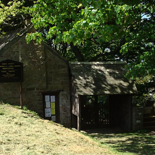 Stile, lychgate and former mortuary adjoining lychgate at south about 20m south-east of the Church of St Morwenna