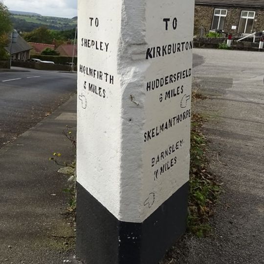 Guide Post At Junction With Far Bank