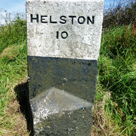 Milestone, by road jct, N of "Lizard" sign