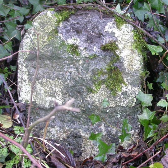 Milestone, E of Maudlin Cross, 60m E of house 'Green View'.