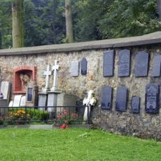 Wall of Saints Simon and Jude church graveyard in Szalejów Dolny