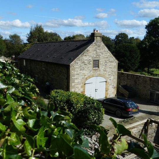 Coach house and stables east of The Rookery
