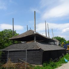 Twee gekoppelde schuurbergen