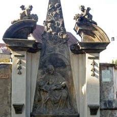 Obelisk with a statue of the Virgin Mary