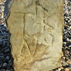 Hraniční kámen na návsi v Lučním Chvojně