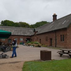 E shaped range of farm buildings to the east of Speke Hall