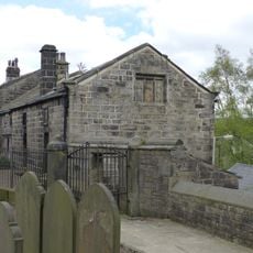 Walls, railings and gateway to Church of St Thomas a Becket