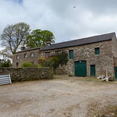 Higher Birkett Farmhouse and buildings adjoining to the east