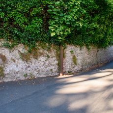 Garden Wall And Doorway To The Cottage