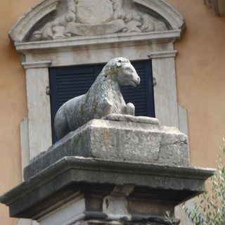 Pillar with statue of a lamb