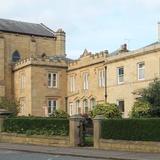 Dwarf Wall In Front Of Numbers 30 32 34 And St Patricks Roman Catholic Church