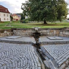 Malá kašna na náměstí Jiřího v Jiřetíně pod Jedlovou