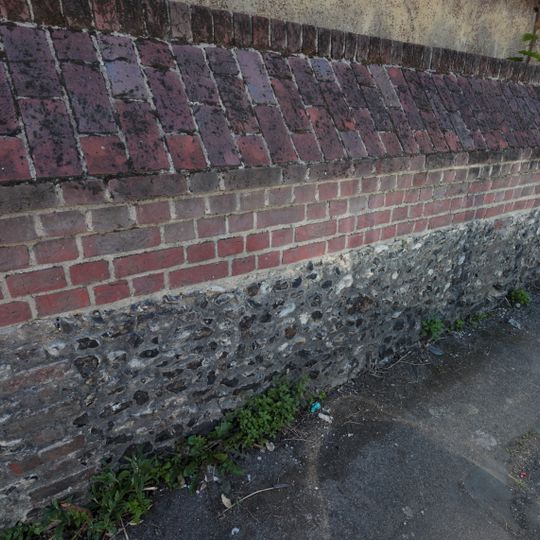Wall Running Along South Side Of Road