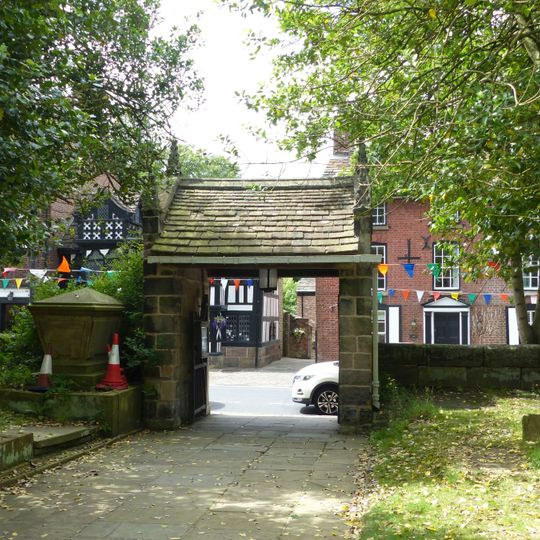 Lychgate and west wall of St Peter's churchyard