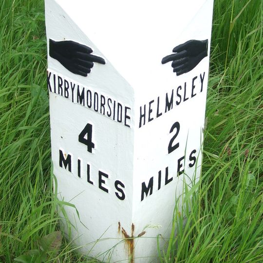 Milestone Approximately 0.5 Miles West Of Village