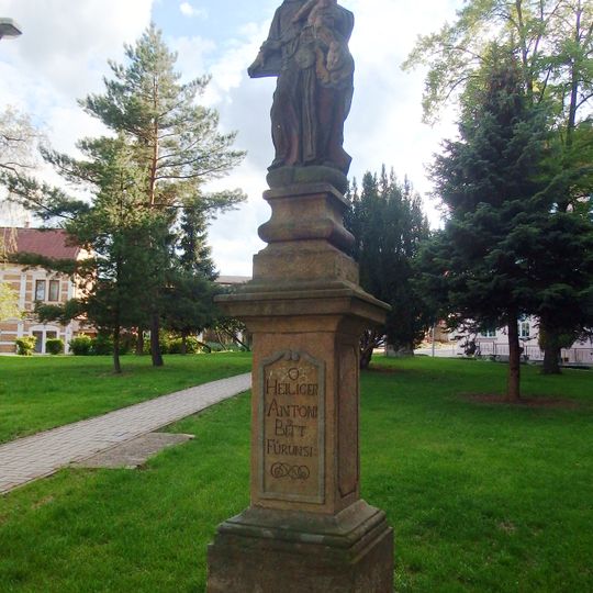 Socha svatého Antonína Paduánského v parku v Mostecké ulici v Bílině