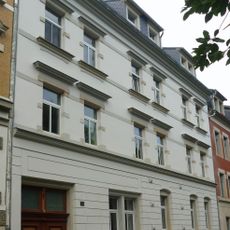 Mietshaus mit Laden in geschlossener Bebauung Mühlstraße 22