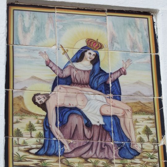 Ceramic panel of Our Lady of Sorrows at Mare de Déu de les Angoixes street
