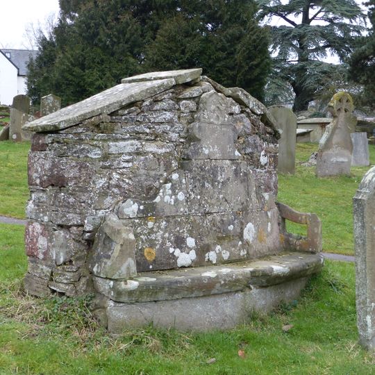 Stone bench approximately 18 metres east of chancel of Church of St Giles