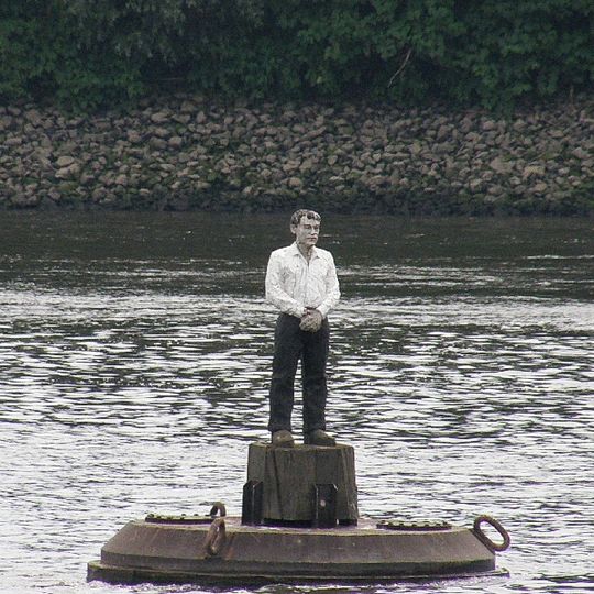 Vier Männer auf Bojen by Stephan Balkenhol