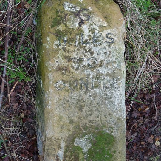 Milestone, a mile E of village