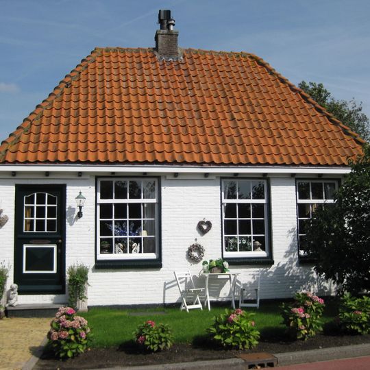 Huis met bijzondere schoorsteen