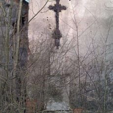 Křížek v Líšině u zdi