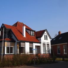 Rentenierswoning met aangebouwd koetshuis