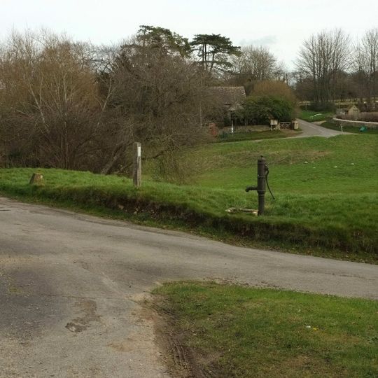 Village Pump And Stone Trough At The Western Corner Of The Green