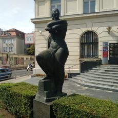 Žena