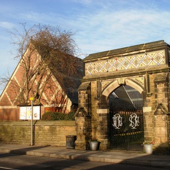 Stone Gateway And Attached Wall At Entrance To Memorial Gardens
