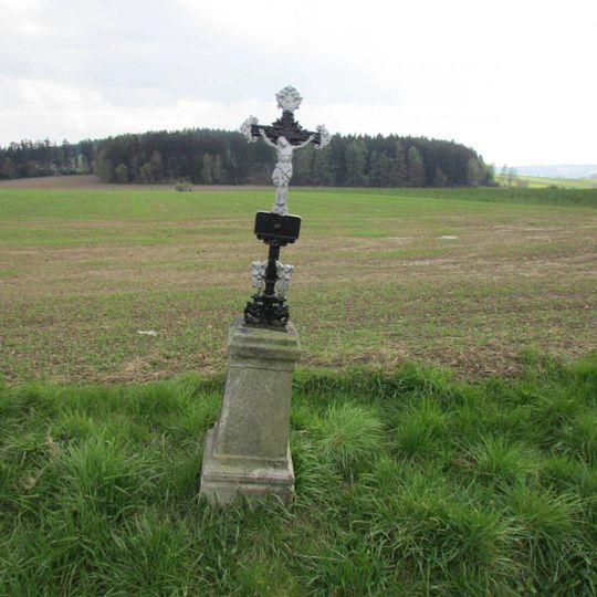 Kříž západně od Řemenova u cesty do Chválova