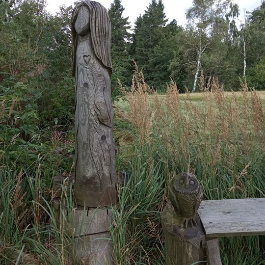 Statue of woman and owl at Zvičina