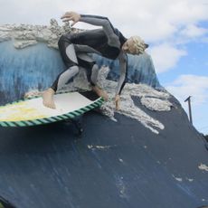 Surfer Riding a Wave