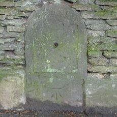 Milestone, W side of The Chipping.