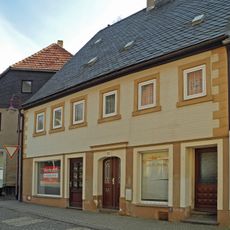 Residential house in closed development to the right Lange Straße 22