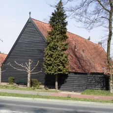 Met pannen gedekte houten tabaksschuur met beweegbaar ventilatie-systeem