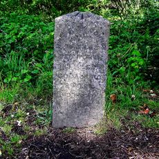 Milestone, Petworth Road, jct with Oxted Green, Milford, in lay-by