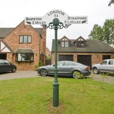 Milepost, Stratford Road, N of Post Office, by "Hillcrest" 17m W of The Lodge