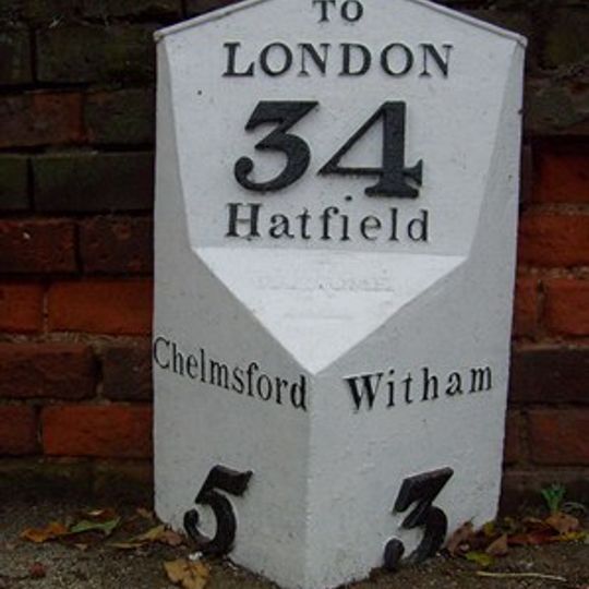 Milepost, between entrances to Crix Farm, opp. Terling Hall Road