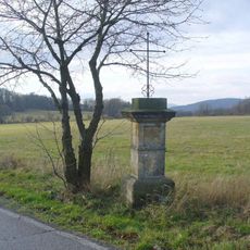 Kříž u silnice jižně od osady Taneček