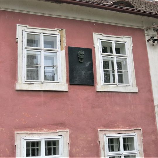 Pamětní deska Jindřicha Šimona Baara na budově fary v Ořechu