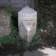 Milestone, Portsmouth Road, opp The Refectory PH
