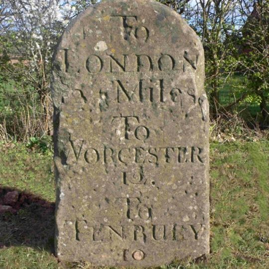 Milestone, 20m N of entrance to The Green Business Centre