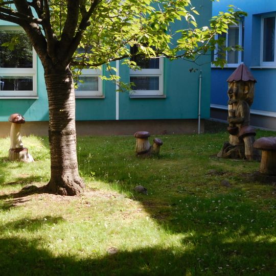 Wooden sculptures at Novoborská kindergarten