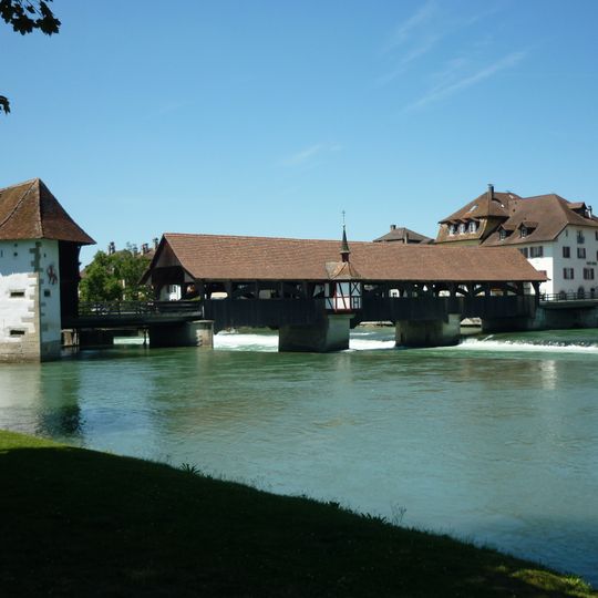 Covered wooden bridge over the river Reuss
