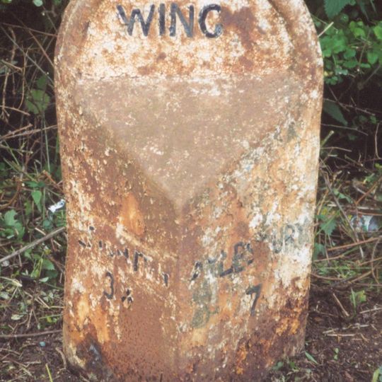 Milepost, Aylesbury Road; on hill, 150m SW of mini-roundabout for school